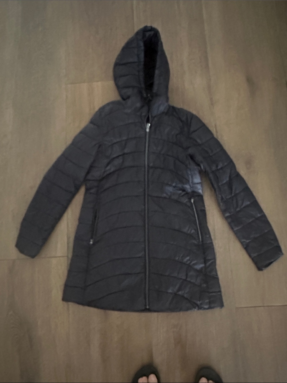 Women’s Black Hooded Quilted Coat.